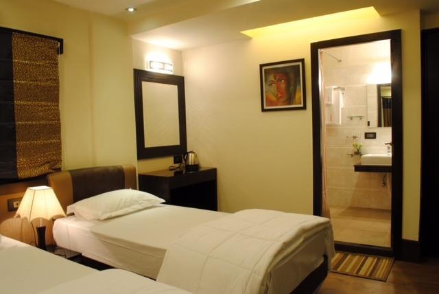 Tangerine Guest House Kolkata Rom bilde
