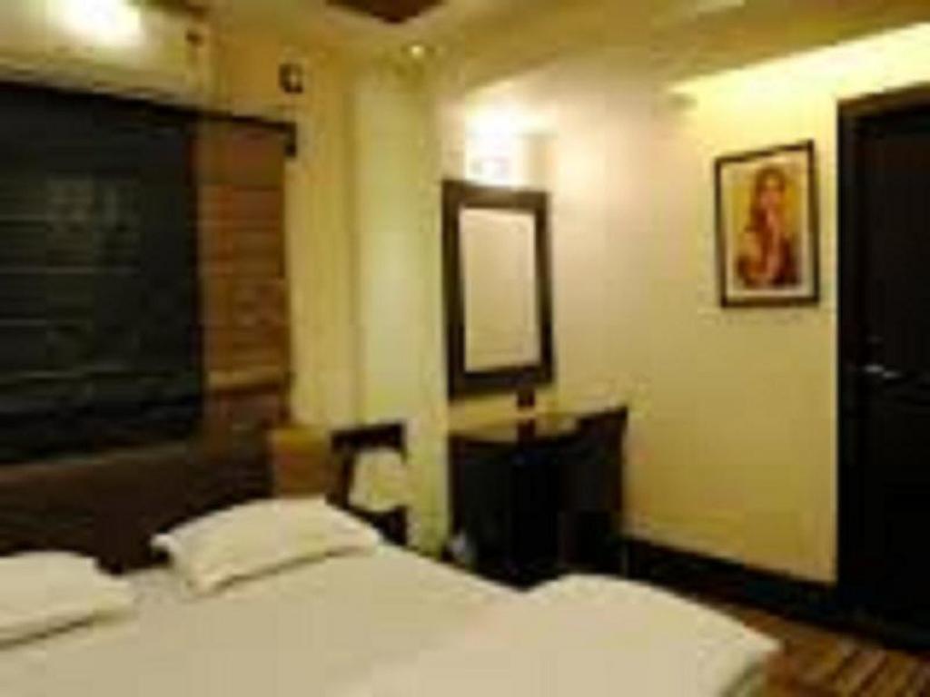 Tangerine Guest House Kolkata Rom bilde